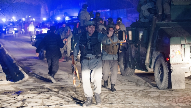 Afghan police stand guard at scene of the fatal attack in the Wazir Akbar Khan neighbourhood Afghan police stand guard at scene of the fatal attack in the Wazir Akbar Khan neighbourhood