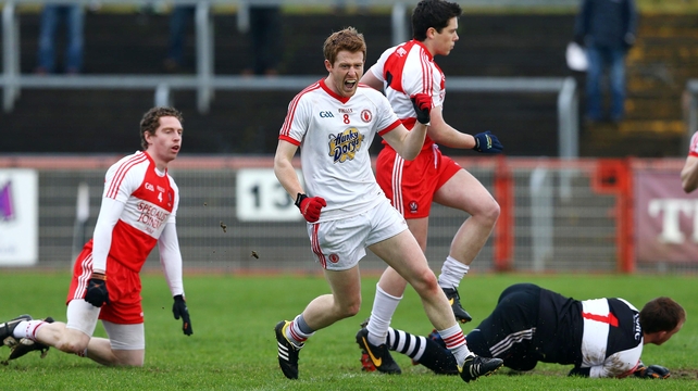 Tyrone's Niall McKenna celebrates scoring his early goal