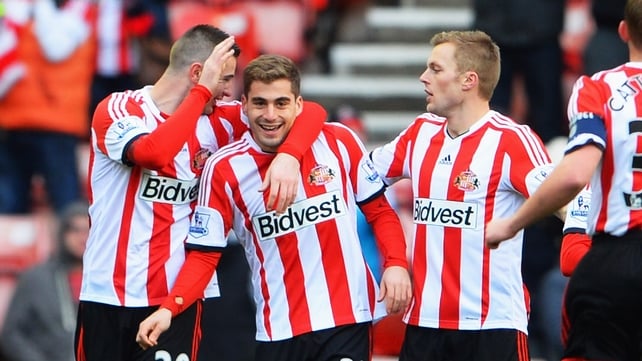 Sunderland's Charis Mavrias (centre) celebrates after his early goal