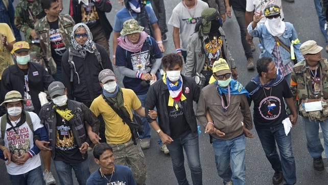 Violence erupted as demonstrators in Bangkok tried to block early voting for an election next week Violence erupted as demonstrators in Bangkok tried to block early voting for an election next week