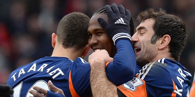 Hugo Rodallega (centre) is congratulated by his Fulham team-mates after his goal