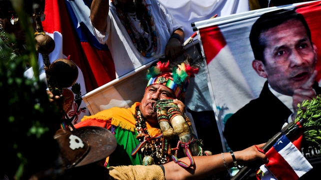 Shamans perform rituals of prediction on the ruling on the maritime dispute between Peru and Chile by The Hague tribunal in Lima Shamans perform rituals of prediction on the ruling on the maritime dispute between Peru and Chile by The Hague tribunal in Lima