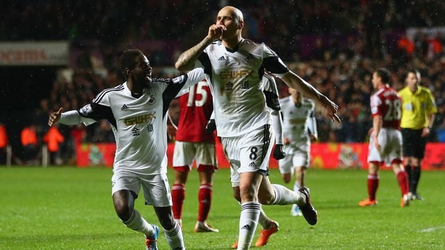 Jonjo Shelvey celebrates Swansea's opening goal in their victory over Fulham