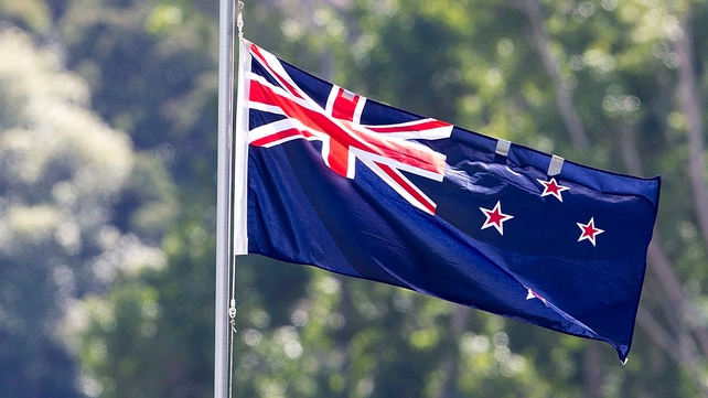 The current flag has attracted criticism because one corner features the symbol of its former colonial master The current flag has attracted criticism because one corner features the symbol of its former colonial master