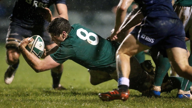 Ireland's Jack O'Donoghue scores the opening try