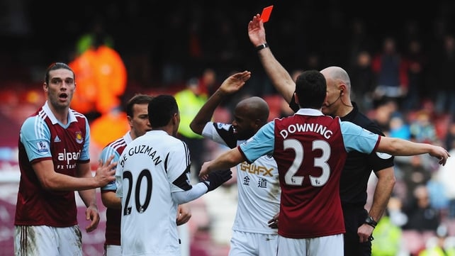 Howard Webb gave Andy Carroll his marching orders against Swansea