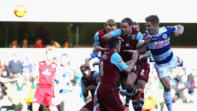 Kevin Doyle rises to head home the opening goal for QPR