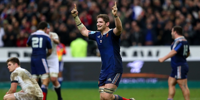 Pascal Pape celebrates as England's Owen Farrell looks dejected
