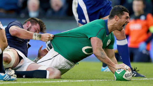 Rob Kearney celebrates as he goes over for his score