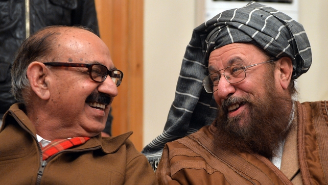 Tehreek-e-Taliban Pakistan committee member and senior religious party leader Maulana Sami-ul-Haq (R) and Special Assistant to Pakistan's prime minister Irfan Siddiqui smile prior to a joint press conference following their meeting at the Khyber Pakhtunkh Tehreek-e-Taliban Pakistan committee member and senior religious party leader Maulana Sami-ul-Haq (R) and Special Assistant to Pakistan's prime minister Irfan Siddiqui smile prior to a joint press conference following their meeting at the Khyber Pakhtunkh