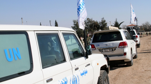 United Nations (UN) vehicles parked before bringing in aid to civilians in the rebel-held areas of the Syrian city of Homs United Nations (UN) vehicles parked before bringing in aid to civilians in the rebel-held areas of the Syrian city of Homs