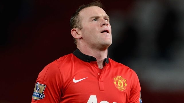 Wayne Rooney is dejected after the game