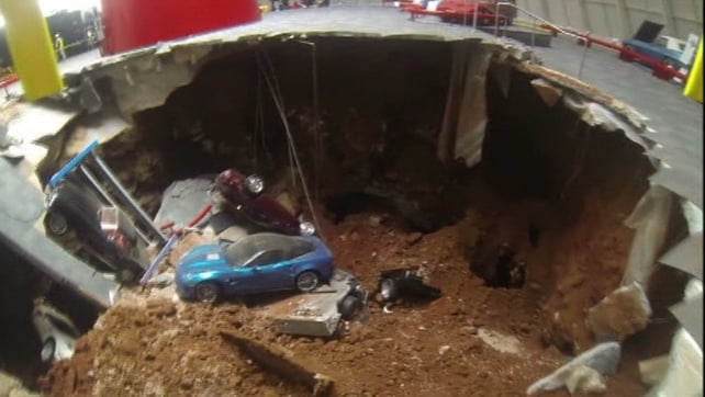 The sinkhole, measuring 12 metres wide and up to nine metres deep, opened up early yesterday morning The sinkhole, measuring 12 metres wide and up to nine metres deep, opened up early yesterday morning