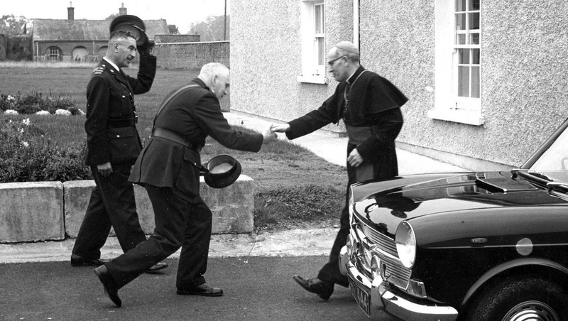 Chief Superintendent McDonagh greeting Bishop Morris at the college's opening ceremony (Pic: Brendan Treacy)