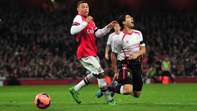 Liverpool's Luiz Suarez was denied what appeared a certain penalty