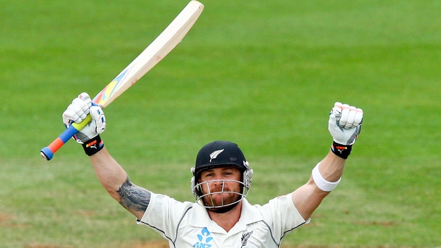 Brendon McCullum celebrates his 300th run