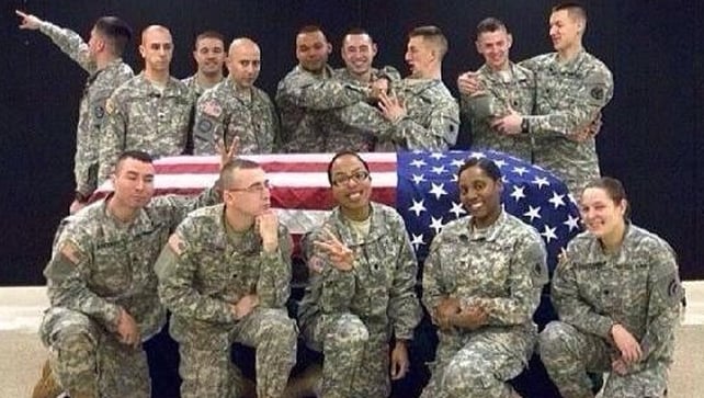The photo was taken around an empty casket at a training centre in Arkansas The photo was taken around an empty casket at a training centre in Arkansas