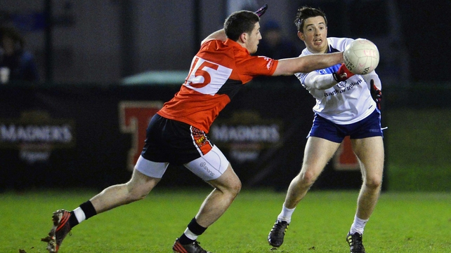 UCC's Paul Geaney and UUJ's Ronan O'Neill