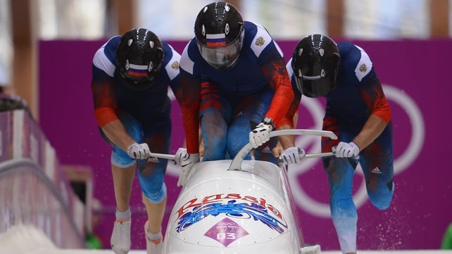 Pilot Alexander Zubkov, Alexey Negodaylo, Dmitry Trunenkov and Alexey Voevoda of Russia make a run