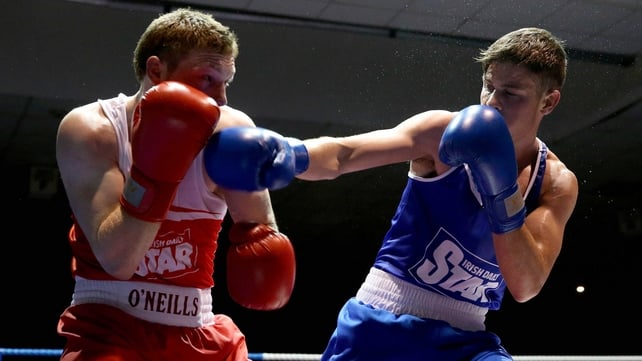 Michael Nevin (blue) caused an upset with victory against Ray Moylette in the light-welterweight division