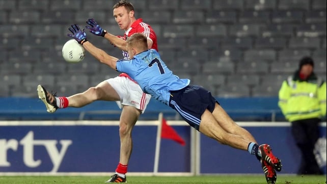 Dublin's Jonny Cooper attempts to block John Hayes' effort