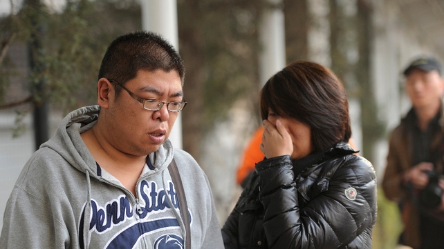Relatives wait for news on missing flight MH370 Relatives wait for news on missing flight MH370