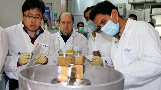 A team from the International Atomic Energy Agency checks the enrichment process inside a uranium enrichment plant in central Iran A team from the International Atomic Energy Agency checks the enrichment process inside a uranium enrichment plant in central Iran