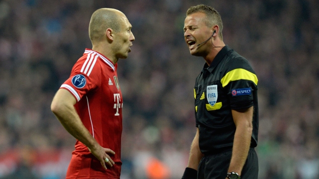 Arjen Robben debates with the referee during last night's match