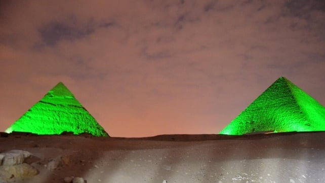 The pyramids were also lit up with green to mark the occasion