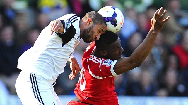 Ashley Williams and Victor Anichebe