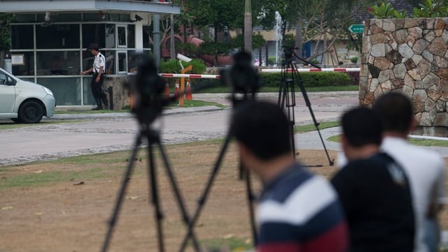 Photographers gathered outside the residence of Captain Zaharie Ahmad Shah (Pic: EPA) Photographers gathered outside the residence of Captain Zaharie Ahmad Shah (Pic: EPA)