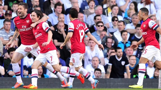 Tomas Rosicky celebrates with his Arsenal team-mates at White Hart Lane