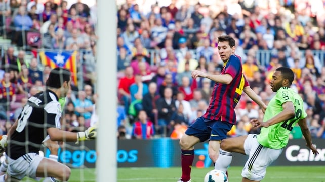 Lionel Messi scores his first of three goals against an Osasuna side that had no answer to Barcelona's attacking prowess