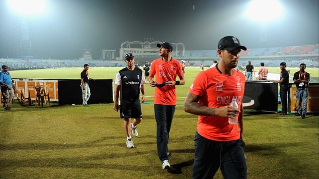 England captain Stuart Broad and Jade Dernbach leave the field as second rain shower stops play