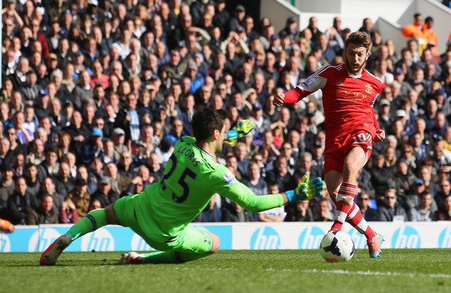 Adam Lallana of Southampton scores his team's second goal past Spurs' goalkeeper Hugo Lloris
