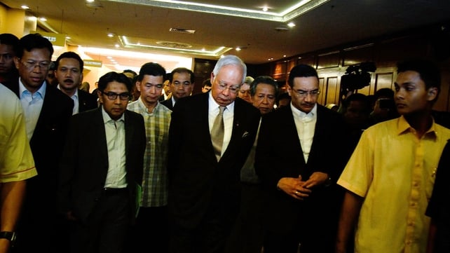 Malaysia's Prime Minister Najib Razak leaves after a news conference to announce that new data has concluded that flight MH370's final position was in the southern Indian Ocean Malaysia's Prime Minister Najib Razak leaves after a news conference to announce that new data has concluded that flight MH370's final position was in the southern Indian Ocean