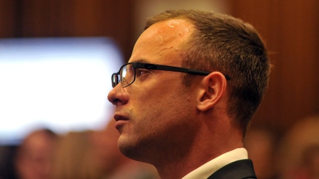 Oscar Pistorius cries as he sits in the dock Oscar Pistorius cries as he sits in the dock