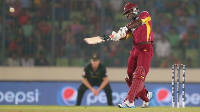 Darren Sammy of the West Indies hits a six in the final over