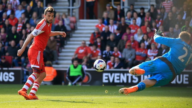 Jay Rodriguez of Southampton scores the opening goal past Newcastle goalkeeper Robert Elliot