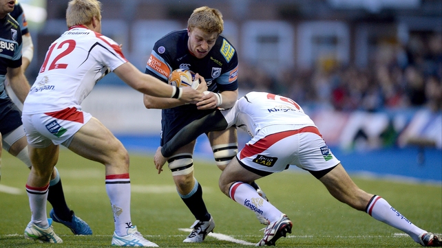 Luke Marshall and Jared Payne of Ulster get to grips with Cardiff's Macauley Cook