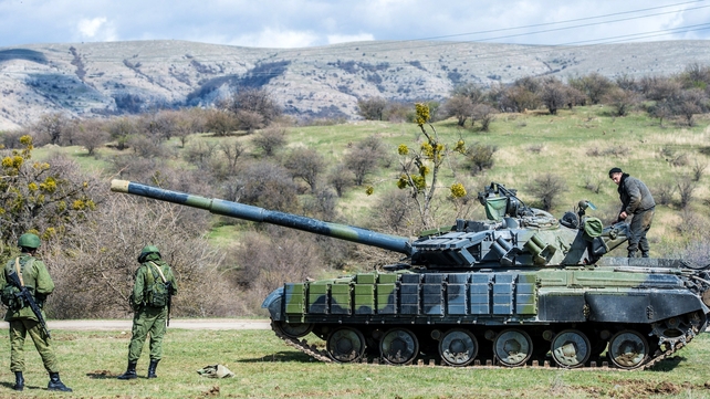 Vladimir Putin said the troops would return to base at the end of spring exercises Vladimir Putin said the troops would return to base at the end of spring exercises