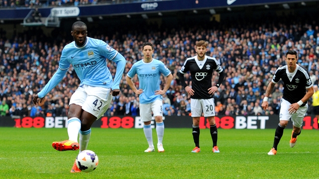 Yaya Toure gives Man City an early lead from the penalty spot