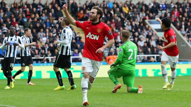 Juan Mata celebrates after scoring his second goal