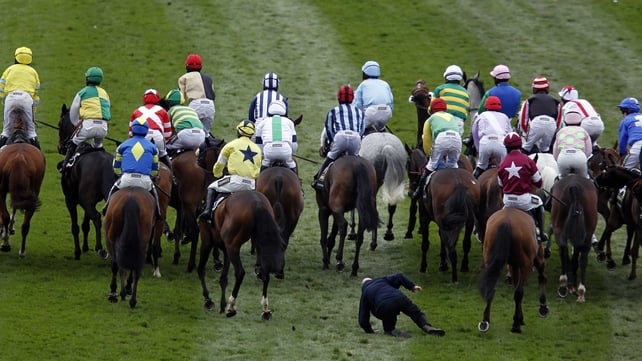 Simon McNeill was knocked over during yet another unsatisfactory start to the Grand National
