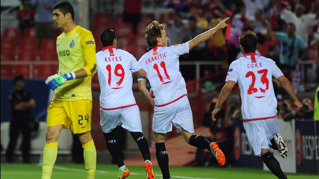 Sevilla's Swiss midfielder Ivan Rakitic (2ndR) celebrates after scoring
