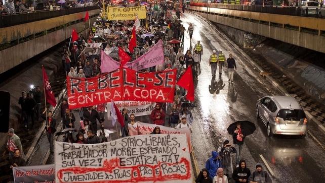 About 1,000 people marched along the key Avenida Paulista road in Sao Paulo About 1,000 people marched along the key Avenida Paulista road in Sao Paulo