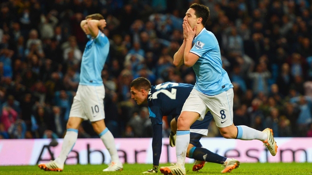 Samir Nasri (R) missed a great chance at the very end