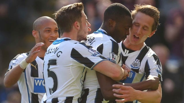 Local hero Shola Ameobi celebrates with team-mates after grabbing the opener at St James Park but it turned sour for Newcastle