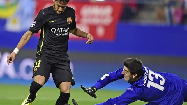Thibaut Courtois in action for Atletico Madrid against Barcelona