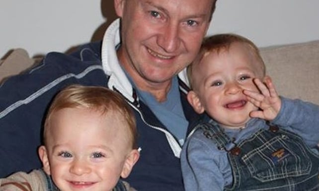 The twins pictured with their father Gary Clarence The twins pictured with their father Gary Clarence